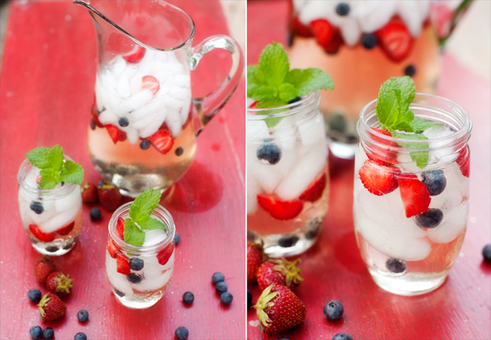 Red White Blue Spritzer - White wine spritzer with strawberries and blueberries garnished with mint.