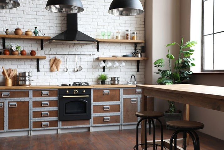 An old fashioned kitchen with some modern hardware upgrades.