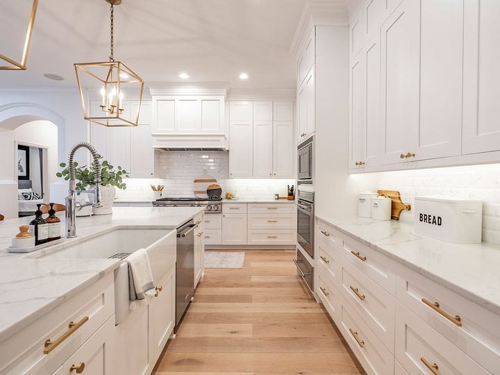 A 3D kitchen design rendering with an itemized cabinet list